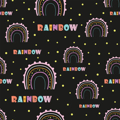 seamless pattern with cute rainbows on black background