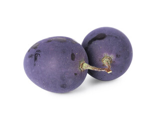 Obraz premium Two ripe dark blue grapes isolated on white