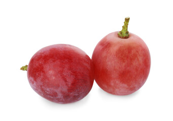 Two ripe red grapes isolated on white