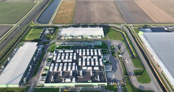 Aerial drone view of a large scale data center in Middenmeer, Hollands Kroon.