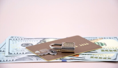 Financial fraud protection concept: credit card, padlock and master key.