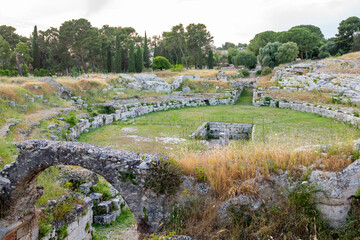 Fototapeta na wymiar Roman Amphitheater in Neapolis Archaeological Park - Siracusa - Italy