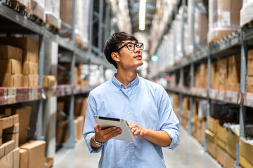 Portrait engineer worker labor asian man shipping order detail check goods and supplies on shelves...