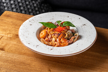 Tasty appetizing pasta spaghetti with shrimps