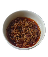 Top view of a bowl of sweet and sour sauce on white background