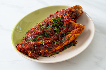 Deep–fried fish and chili sauce