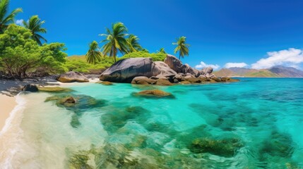 The Baths beach area major tourist attraction at Virgin Gorda, British Virgin Islands with turquoise water and huge granite boulders.
