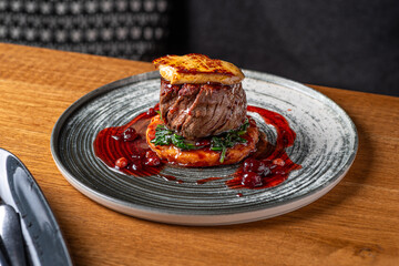 Tournedos Rossini with foie-gras. Fillet mignon steak Serving in the restauran. - obrazy, fototapety, plakaty
