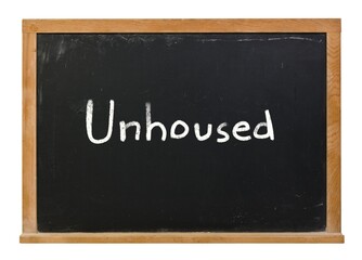 Unhoused written in white chalk on a black chalkboard isolated on white