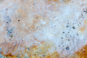 Colours, textures and patterns on a natural stone. Stone background.