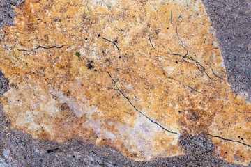 Colours, textures and patterns on a natural stone. Stone background.