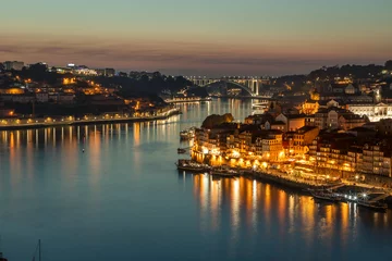 Foto op Plexiglas View of the Douro river and the city of Porto at sunset in autumn in Portugal © MKavalenkau