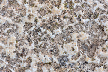 Colours, textures and patterns on a natural stone. Stone background.