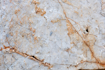 Colours, textures and patterns on a natural stone. Stone background.