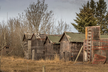 Rustic out buildings dot the countryside Red Deer County Alberta Canada