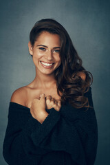 Woman, smile and portrait in studio, fashion and face by background, stylish and cool clothing. Happy female person, beauty and cosmetics, confident and trendy in aesthetic, pride and positive