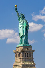 Vertical shot of the Statue of Liberty and pedestal, New York City, USA