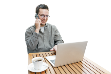 Uses a laptop and a smartphone, a man calls the bank on the phone uses cellular communication with a loan manager. Transparent isolated background.