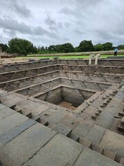 Hampi, Karnataka India - July 23 2023: Pushkarini or water reservoir in the premises of Royal Palace.