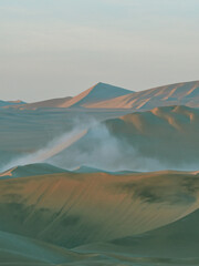 Sunrise over the sand desert