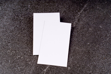 Business card mockup, front and back, on a dark background, a template for design presentation,...