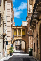 Fototapeta na wymiar Street in the old town in Marsala, Sicily, Italy