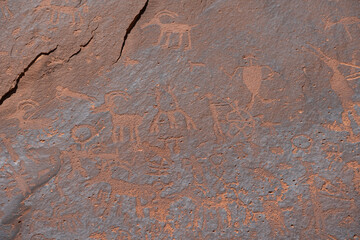 Detail of figures depicted on the wall of the  Sand Island Petroglyph Panel