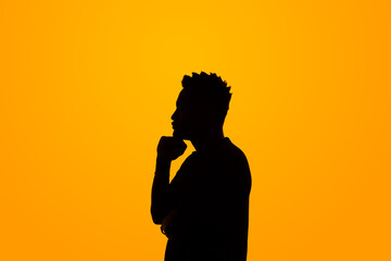 silhouette of a person thinking