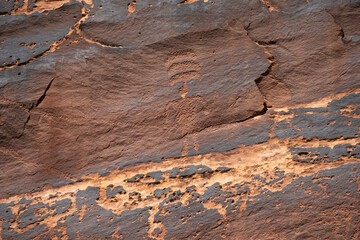 Detail of figures depicted on the wall of the  Sand Island Petroglyph Panel