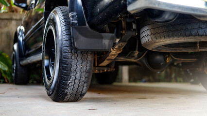 The undercarriage of a pickup truck has been used and traveled in many areas and must be maintained...
