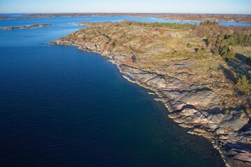 Fototapeta na wymiar Aerial view of rocky seashore on the island of Kökar in spring, Ahvenanmaa, Finland.