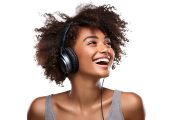 Young African American woman, passionate about music, revelling in the beats and rhythms flowing through her headphones, cut out