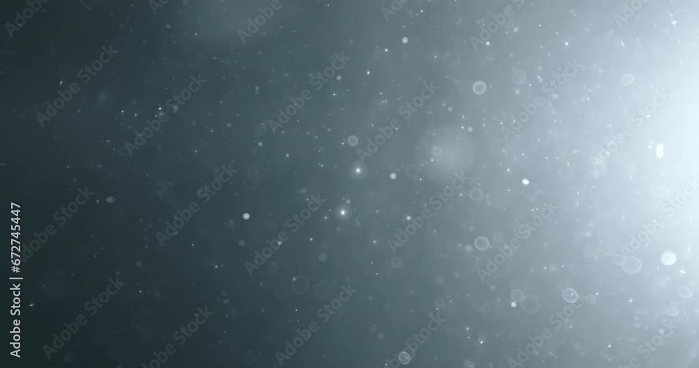Wall mural floating abstract particle bokeh on dark background