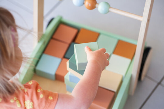 Toddler building block tower in push trolley