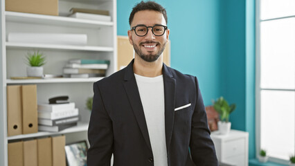 Young arab man business worker smiling confident at the office