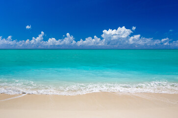 Beach and tropical sea. Blue sea and blue sky