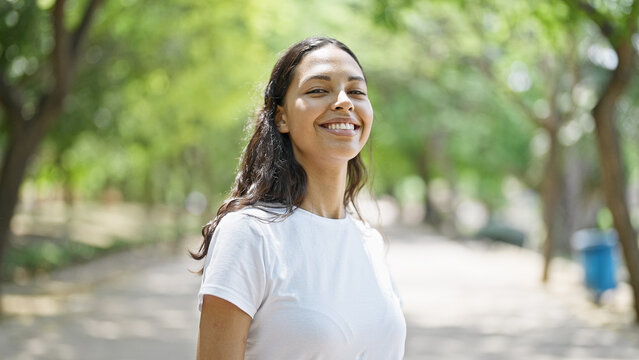 African american woman smiling confident standing at park