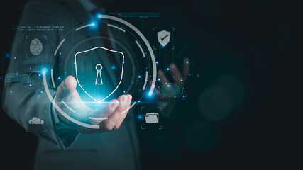 Businessman holds phone and login padlock icon Represents protection against external hacking of the system. Security concepts for protecting against code, viruses, firmware, and malware