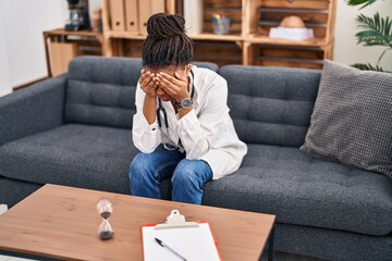 African american woman doctor patient stressed having psychology session at psychology center