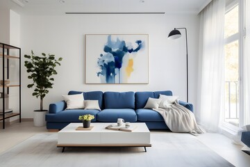White living room with blue sofa and white carpet.
