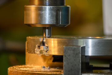 The T-slot cutting process on NC milling machine with T-slot cutter.