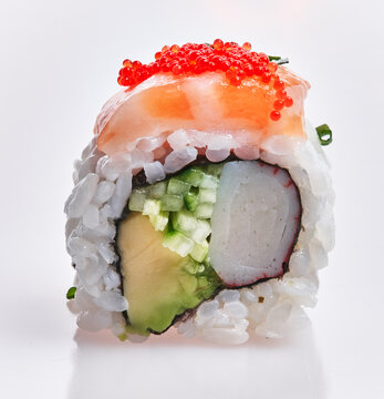  Single delicious salmon uramaki roll over isolated white background