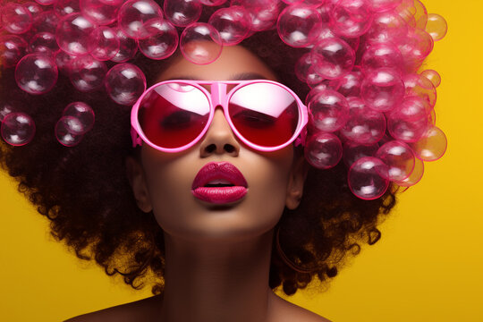 Fashion, make-up, style concept. Beautiful afro woman with soap bubbles and sunglasses minimalist close-up studio portrait. Vivid colors, pop-art style