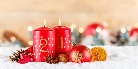 Second 2nd Sunday in advent with burning candle Christmas time decoration panorama with copyspace...