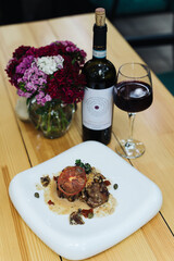 The camera focuses on pork tenderloin, perfectly complemented by a luscious mushroom sauce
