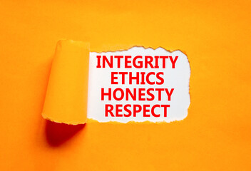 Integrity ethics honesty respect symbol. Concept word Integrity Ethics Honesty Respect on beautiful white paper. Beautiful orange paper background. Business integrity ethics honesty respect concept.
