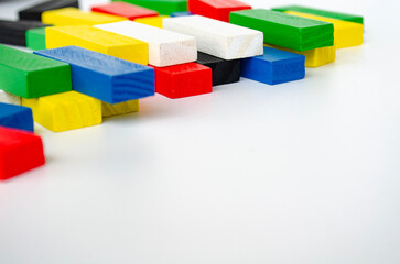 Fototapeta premium Colorful wooden blocks on white background with customizable space for text. Copy space.