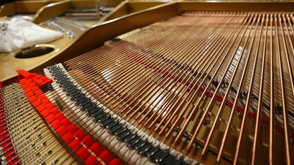 Closeup of the inside detail of a piano