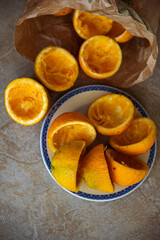 Oranges being squeezed for fresh orange juice