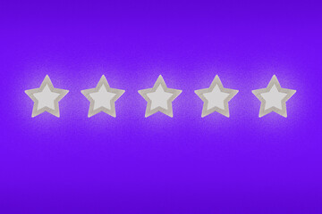 Gray, silver five star shape on a purple background. The best excellent business services rating customer experience concept. Increase rating or ranking